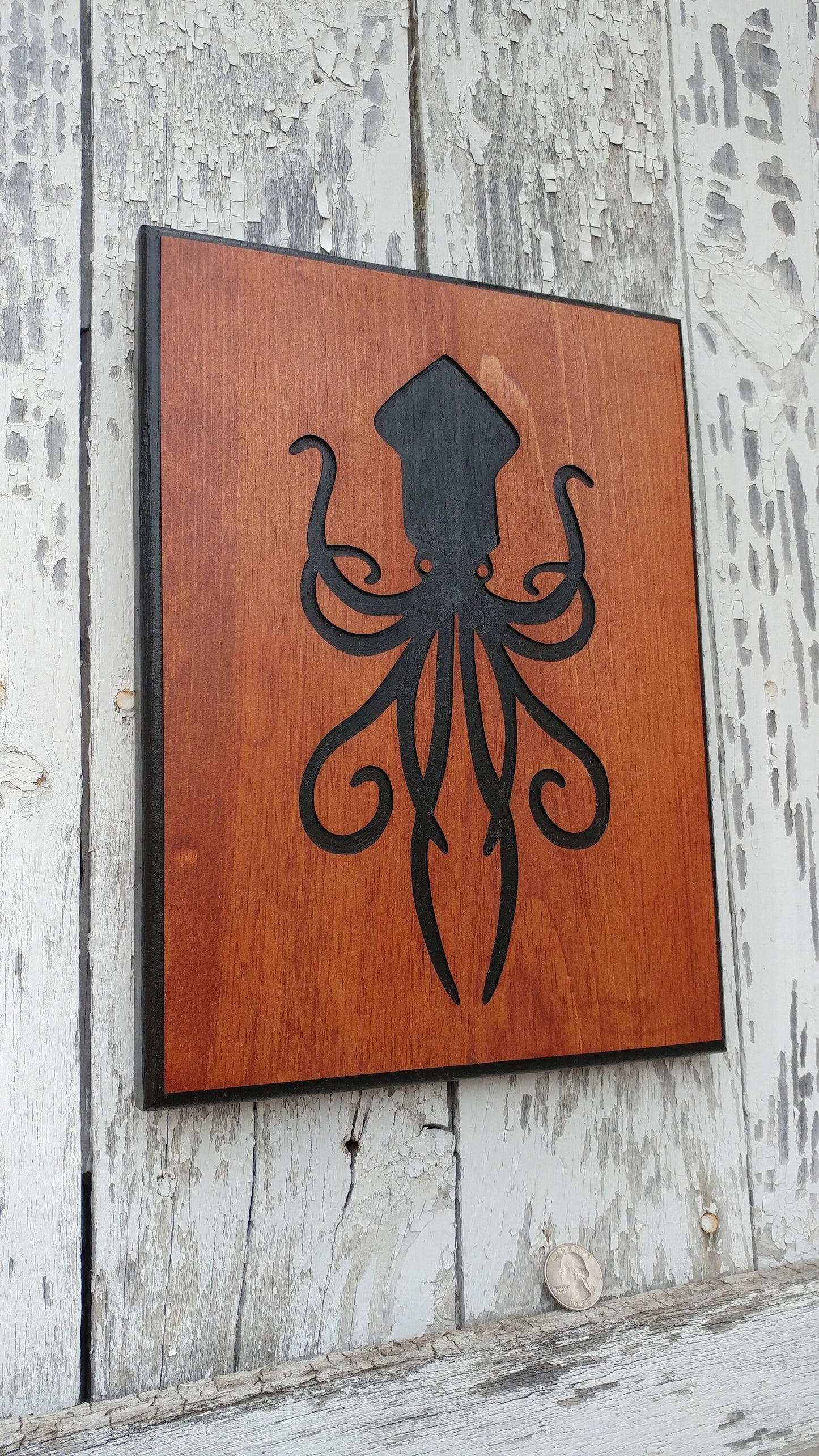 The Kraken carved wood sign