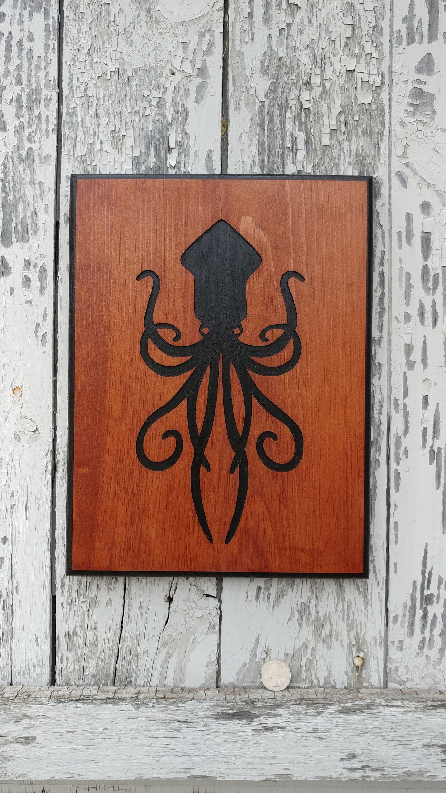 The Kraken carved wood sign