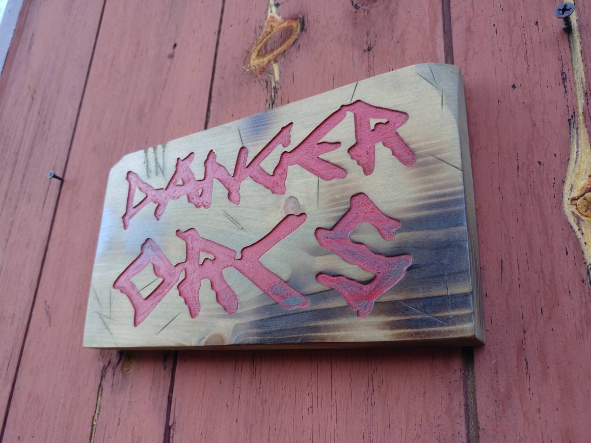 Danger Orcs, carved adventure sign