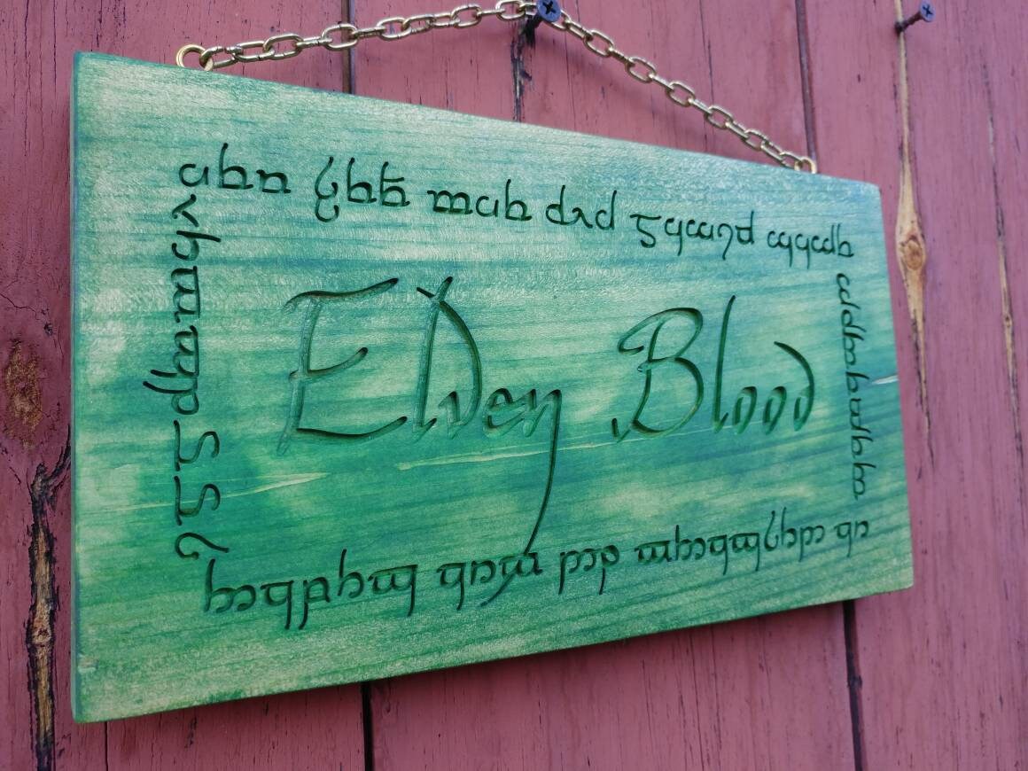 Elven Blood, carved elf sign with sindarin inscription.