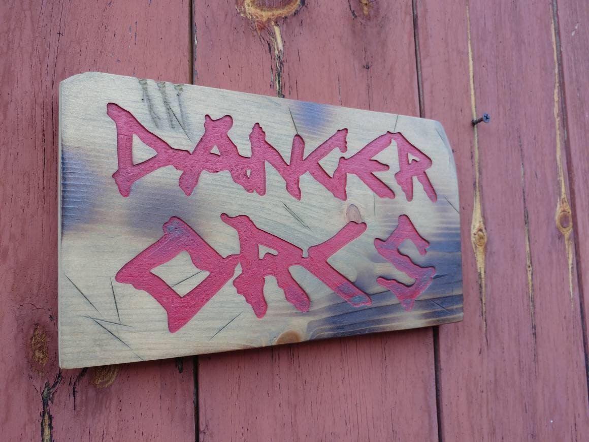 Danger Orcs, carved adventure sign